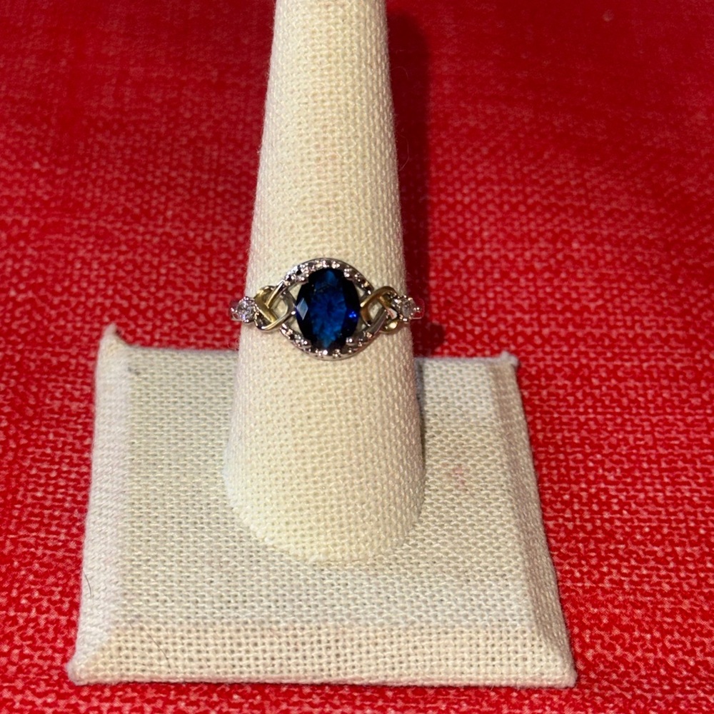 Blue Sapphire Two Tone Halo Ring with CZ Accents